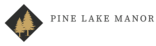 a logo for pine lake manor apartments